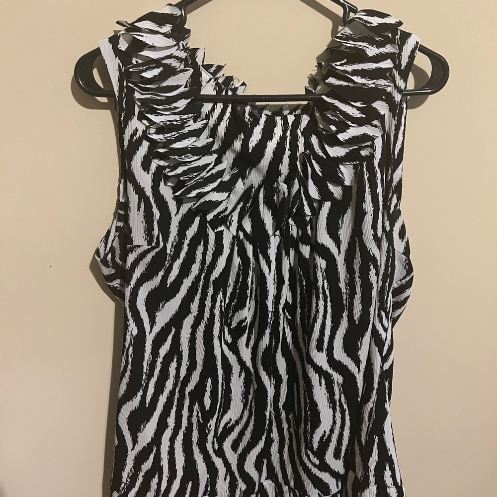 Ladies sleeveless  blouse zebra print.